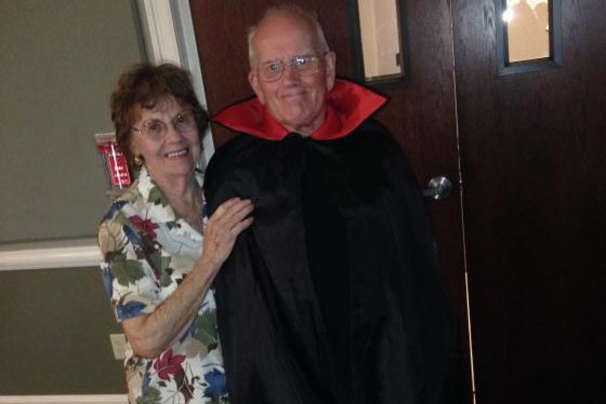 Woman with Man in Vampire Cape