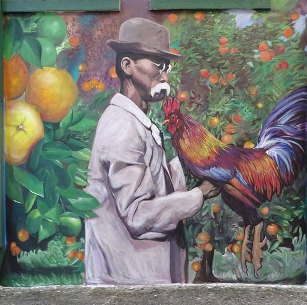 Man with rooster mural